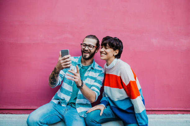 istock Modern young couple taking selfie 1225029491