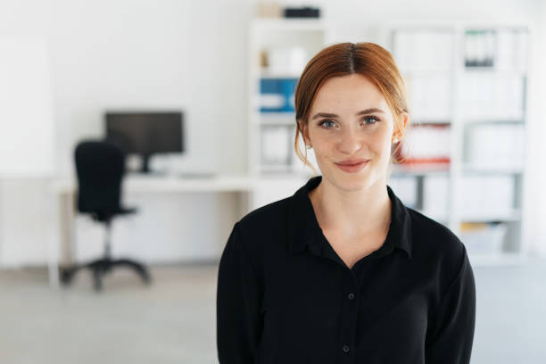 istock Young businesswoman with a quiet friendly smile 1225032572