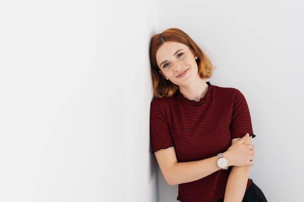 istock Relaxed young woman smiling at the camera 1225032827