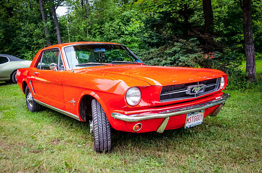 Moncton, New Brunswick, Canada - July 10, 2016 : 1965 Ford Mustang coupe at 2016 Atlantic Nationals Automotive Extravaganza in Centennial Park, Moncton. New Brunswick Canada.