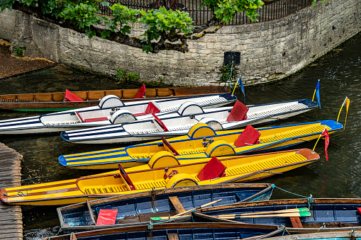 Rowboats and pedal boats on the Thames at Oxford.