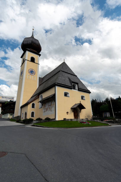 istock Beautiful church and sky in Aurach Austria 1225034312