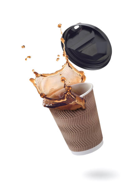 istock splash of coffee in a paper cup on a white background 1225034729