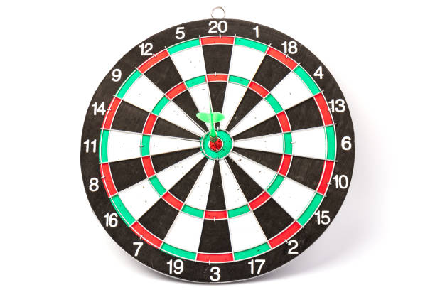 istock Dartboard with darts on white background, closeup. Purpose concept 1225038934