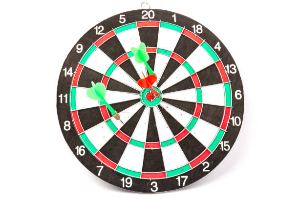 istock Dartboard with darts on white background, closeup. Purpose concept 1225039235