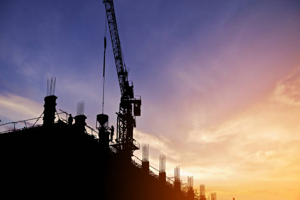 istock Silhouette Construction worker of Building crane on construction site background. 1225041574