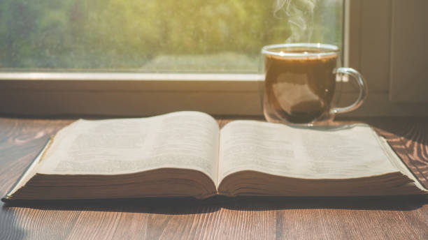 istock The Bible and cup coffee. Reading the bible. 1225044789