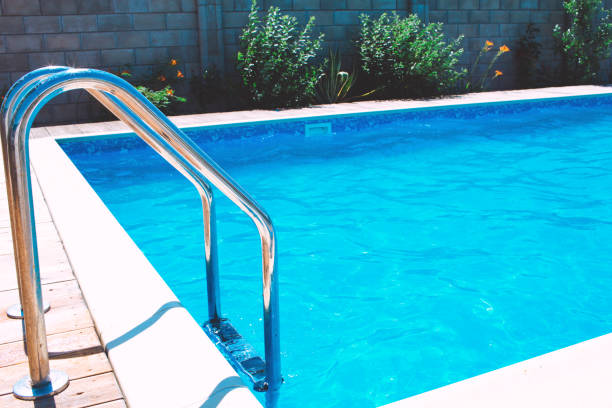 istock Swimming pool with stair at hotel. 1225045314
