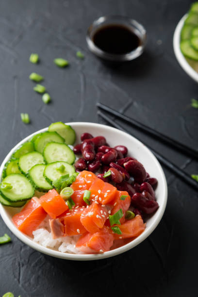 istock Poke Bowl. Salmon, beans, rice in a bowl 1225046840
