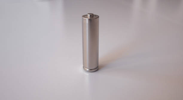 istock A gray AA model battery stands upright on a white background 1225048546