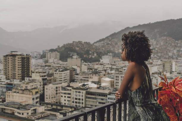 istock Biracial girl on balcony, quarantine 1225052449