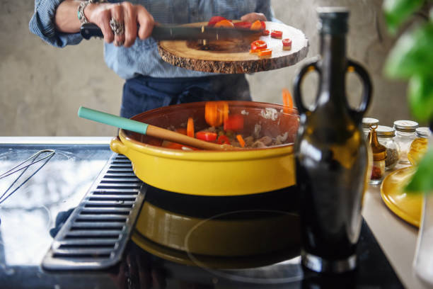 istock Woman making a moroccan tajine 1225055580