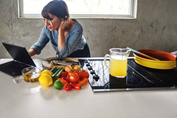 istock Woman making a moroccan tajine 1225055646