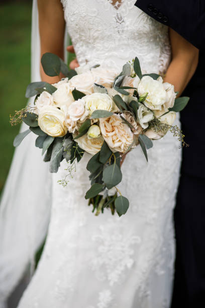 istock Bride hold the bouquet, closeup 1225055815
