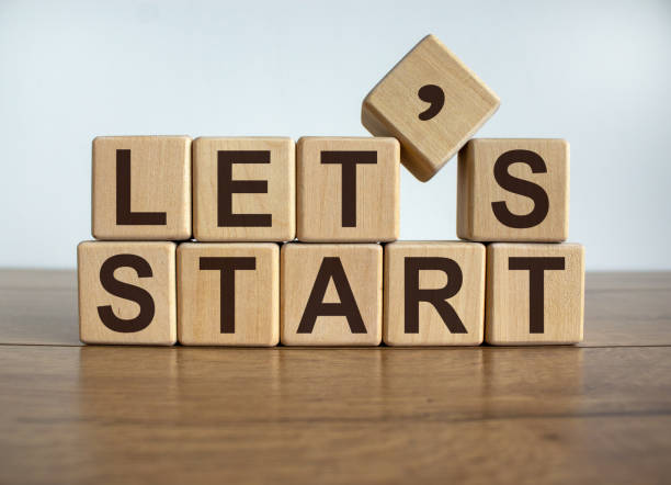 istock Concept word 'lets start' on cubes on a beautiful wooden background. 1225058428