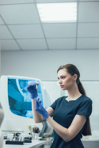 istock Professional scientist working with liquid in test tube 1225058774