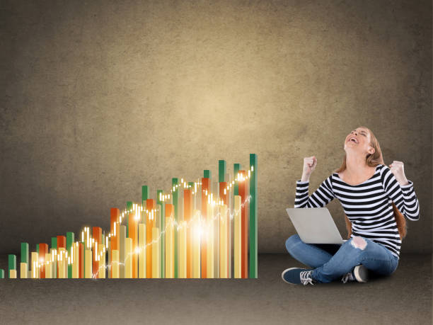 istock Woman celebrating online success 1225060029