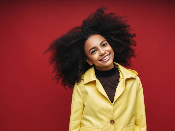 istock Young woman wearing raincoat 1225060232
