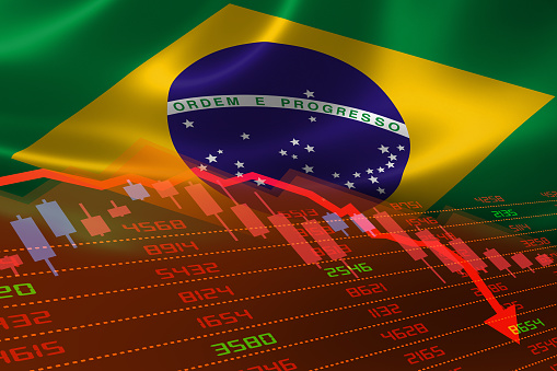 Brazil economic downturn with stock exchange market showing stock chart down and in red negative territory. Business and financial money market crisis concept caused by Covid-19 or other catastrophe.