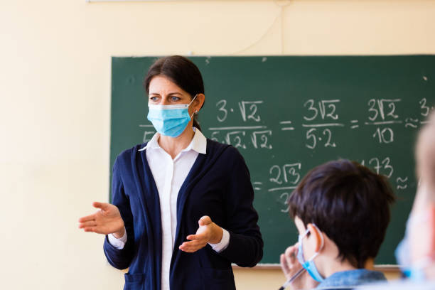 istock Covid-19. A teacher teaches mathematics 1225062725