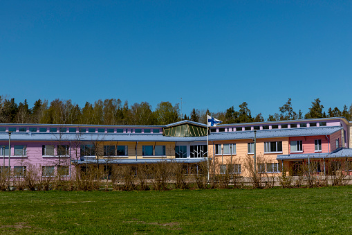 Multi coloured school building in Espoo, with no people.