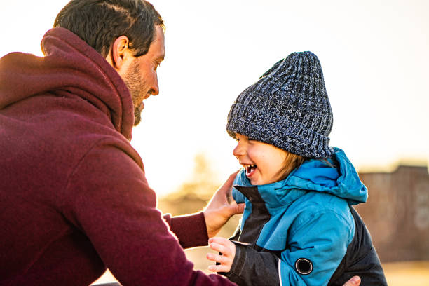 istock Father and son laugh together 1225063181