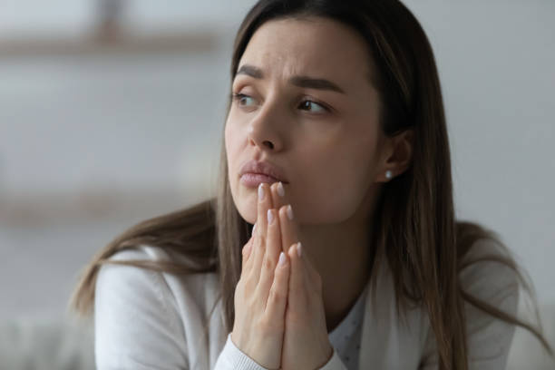 istock Unhappy young woman lost in thoughts feeling depressed 1225064244