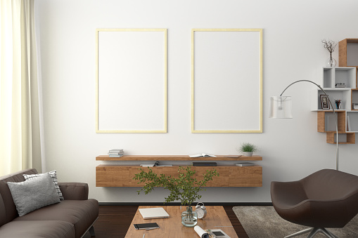 Two vertical blank posters on white wall in interior of modern living room with clipping path around poster. 3d illustration