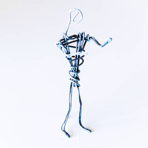 A man of wire stands gesturing with his hands, symbolizing conversation, proof