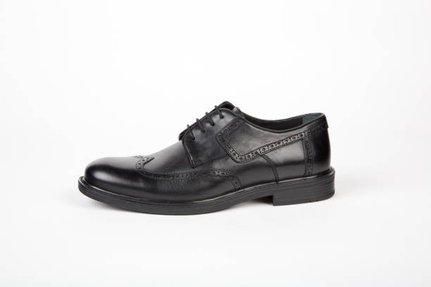 istock Mens shoes on white background 1225066037