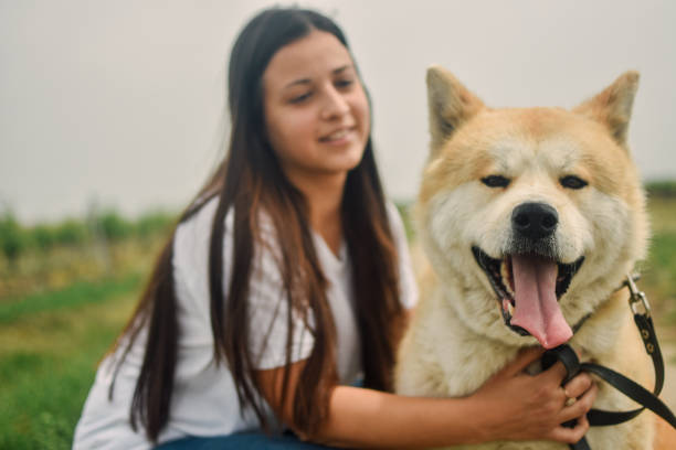 istock Beautiful girl with a beautiful dog 1225067167