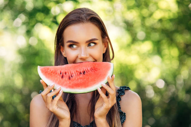 istock Enjoying sunny day wile eating watermelon 1225067440