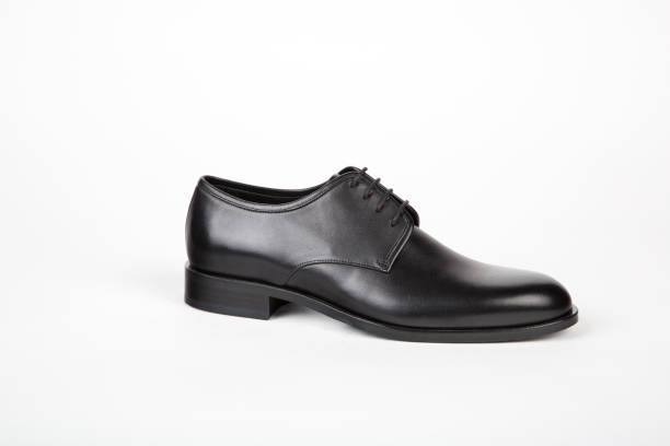 istock Mens shoes on white background 1225069387