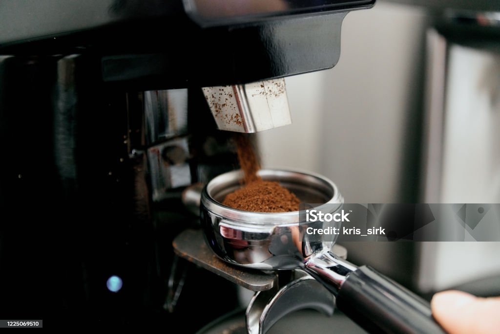 The Process Of Automatic Coffee Grinding In A Coffee Grinder