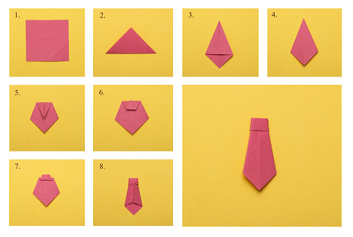 Step-by-step photo instructions on how to make an origami tie. DIY concept. Children's art project a gift for the holiday Father's Day.
