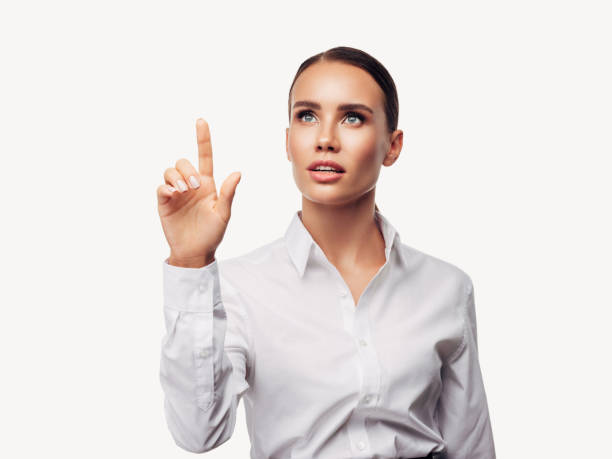 若い実業家の肖像 - business pointing women index finger ストックフォトと画像