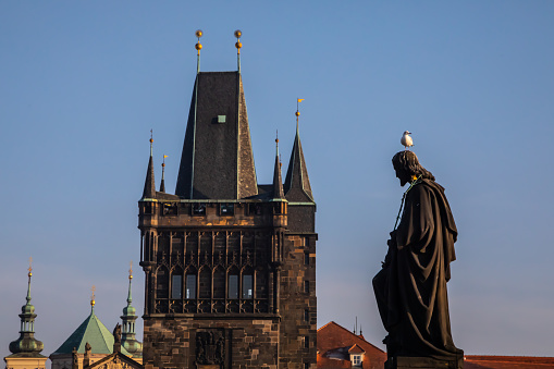 Statue of Saint Joseph with Jesus on Charles Bridge - Karlův most - in the middle of Prague, over River Vltava - Moldva. Made by Josef Max, 1854.