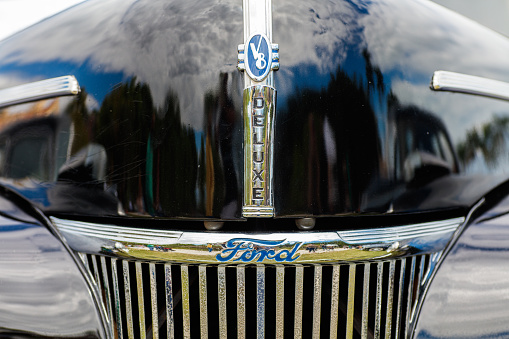 Miami, Florida USA - February 28, 2016: Close up view of the front of a beautifully restored vintage Ford Deluxe automobile at a public car show.