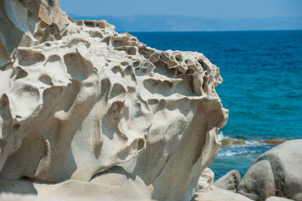 istock Beautiful rock formations on the seaside. Summertime holiday. 1225074403