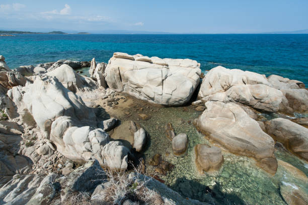 istock Beautiful rock formations on the seaside. Summertime holiday. 1225074407