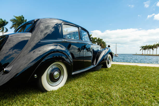 Vintage Rolls Royce Automobile Miami, Florida USA - February 28, 2016: Beautifully restored 1952 Rolls Royce automobile in a outdoor park setting along the bay at a public car show. 1952 1952 stock pictures, royalty-free photos & images