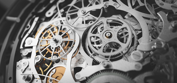 Gears and cogs in clockwork watch mechanism. Craft and precision - elegant detailed stainless steel and metal. 3D illustration