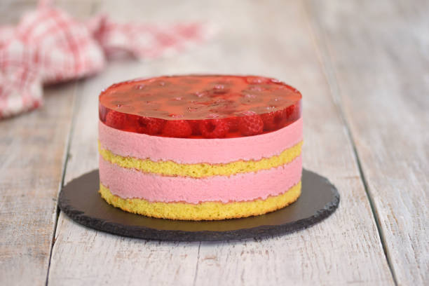 istock Raspberry mousse cake. Cake with jelly and cream. Cake with raspberries 1225085766