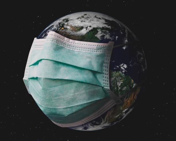 istock Planet earth with surgical mask. 1225087810