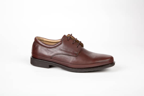 istock Mens shoes on white background 1225089156