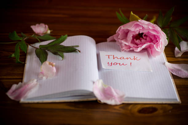 istock pink beautiful peony with petals, blank notebook and greeting card 1225089464