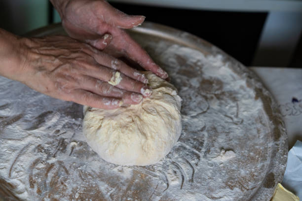 istock Making a pie with cheese and potato dough 1225093137