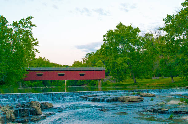 istock Waterfall-Cataract Falls-with covered bridge- On Mill Creek-Owen County Indiana 1225098089