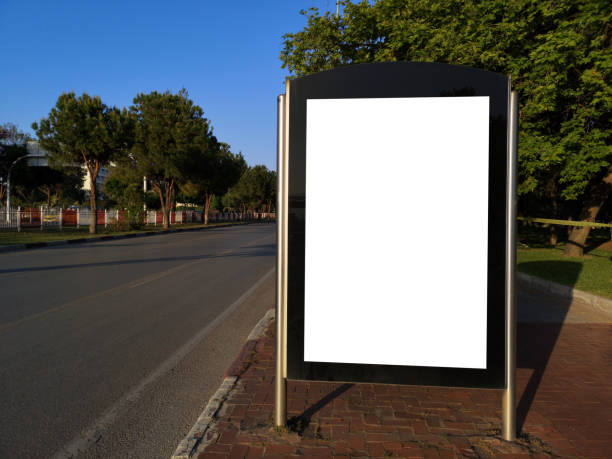 istock Vertical billboard, small city format. near the footpath. With white space for mock-up posters. 1225100370