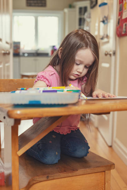 istock Girl Enjoys Colouring 1225102492